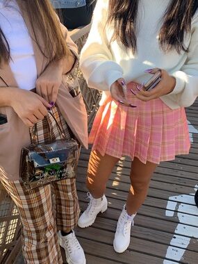 Pink plaid pleated mini skirt